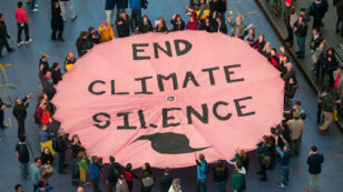 Activists Unfurl Giant ‘End Climate Silence’ Banner in Times Square